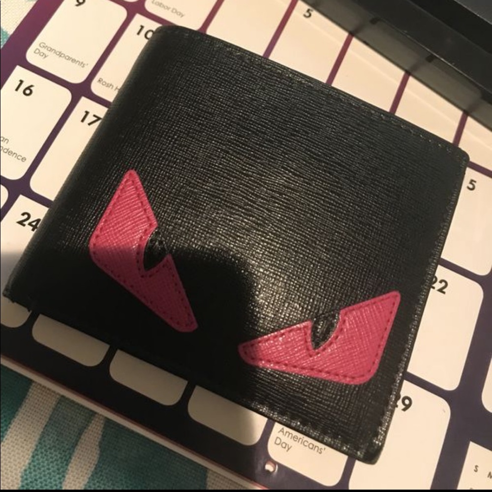 fendi “eye” wallet authentic.